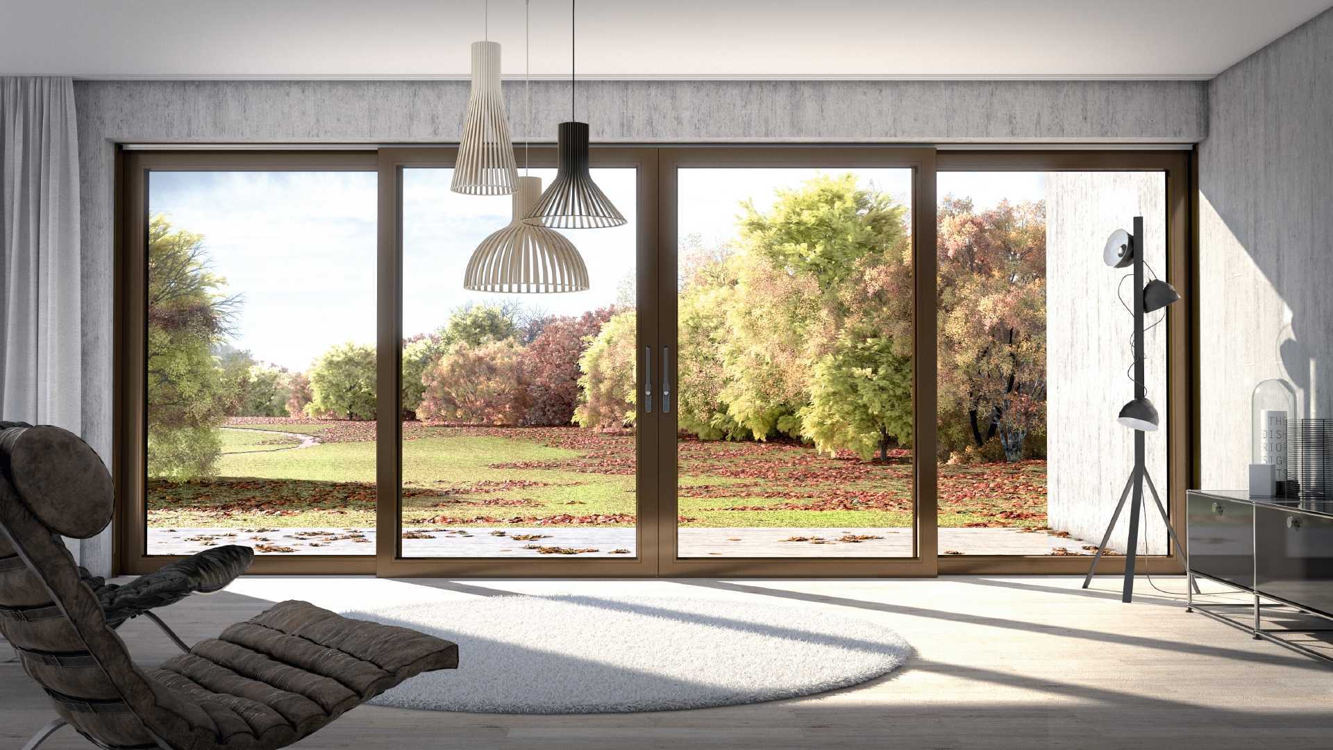 Sliding doors in a woody shade create a natural connection between the interior and exterior. The warm color of the frames harmonizes with the autumn palette of colors beyond the glass, bringing a sense of coziness and balance to the modern space. Such a solution demonstrates how window color can soften architecture and bring a home closer to nature.